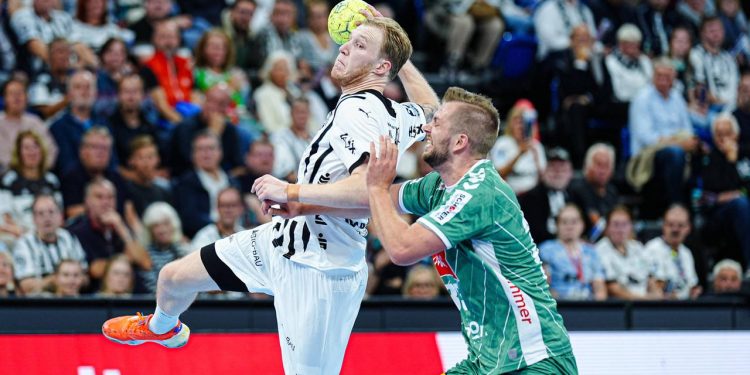 heimsieg-gegen-minden:-thw-kiel-bleibt-tabellenfuehrer